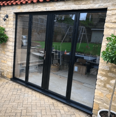 black aluminium doors on heritage building